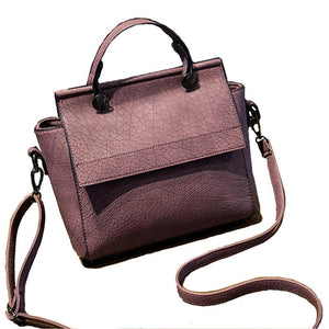 The Trapeze Tote Leather Handbags.