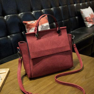 The Trapeze Tote Leather Handbags.